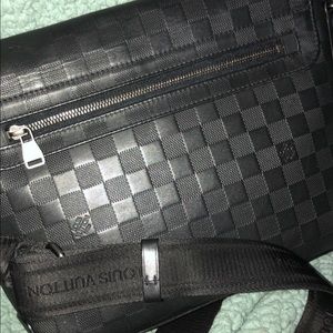 Luis Vuitton messenger bag -I will negotiate price